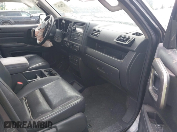 2013 Honda Ridgeline RTL with VIN 5FPYK1F56DB004834, listed as a IAAI auction lot 42706361 with 230,000 mi miles and . Bid and sale history available at DreamBid. Image 5.