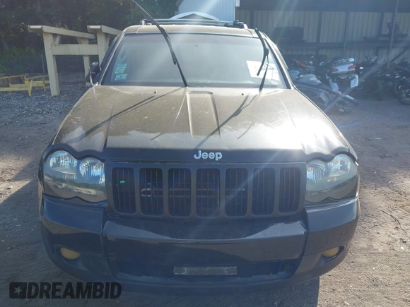 2005 Jeep Grand Cherokee Laredo z VIN 1J4GR48K65C725099, wystawiony jako IAAI lot #42509223 z przebiegiem 249 216 mil mil oraz . Historia ofert i sprzedaży dostępna na DreamBid. Obrazek 13.