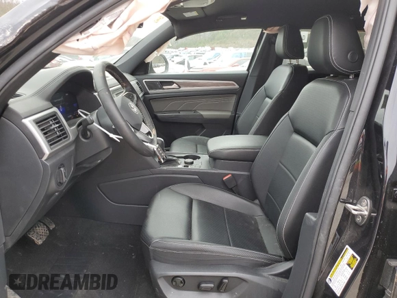 2023 Volkswagen Atlas SE with VIN 1V2LC2CA4PC227994, listed as a Copart auction lot 82517774 with 22,375 mi miles and Salvage title. Bid and sale history available at DreamBid. Image 7.
