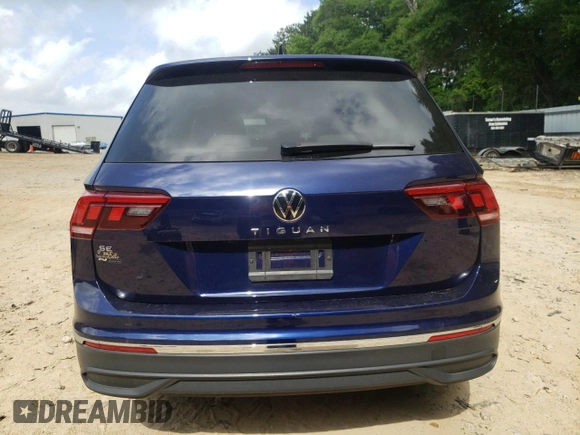 2023 Volkswagen Tiguan SE with VIN 3VV3B7AX9PM102224, listed as a Copart auction lot 57221585 with 21,202 mi miles and Salvage title. Bid and sale history available at DreamBid. Image 6.