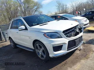 2015 Mercedes-Benz M ML 63 AMG with VIN 4JGDA7EB6FA471585, listed as a IAAI auction lot 41883006 with 39,243 mi miles. Bid and sale history available at carsss.com. Image 1.