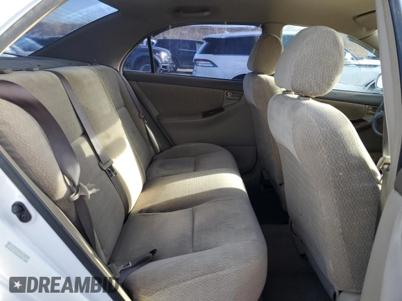2003 Toyota Corolla CE with VIN 1NXBR32EX3Z057713, listed as a Copart auction lot 85710344 with 188,478 mi miles and Salvage Title. Bid and sale history available at DreamBid. Image 10.