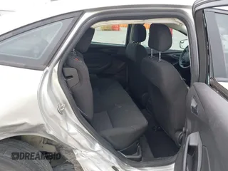 2017 Ford Focus S z VIN 1FADP3E28HL210368, wystawiony jako IAAI lot #42260711 z przebiegiem 69 067 mil mil oraz . Historia ofert i sprzedaży dostępna na DreamBid. Obrazek 8.