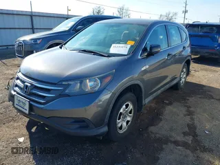 2014 Honda CR-V LX with VIN 2HKRM4H39EH634676, listed as a IAAI auction lot 41233279 with 153,761 mi miles and . Bid and sale history available at carsss.com. Image 18.