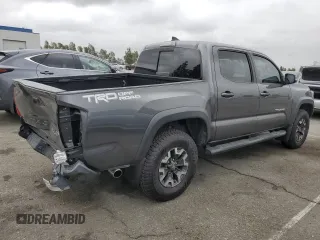 2017 Toyota Tacoma SR5 z VIN 3TMAZ5CNXHM048452, wystawiony jako Copart lot #52996785 z przebiegiem 71 588 mil mil oraz Szkoda całkowita • Salvage title. Historia ofert i sprzedaży dostępna na DreamBid. Obrazek 3.