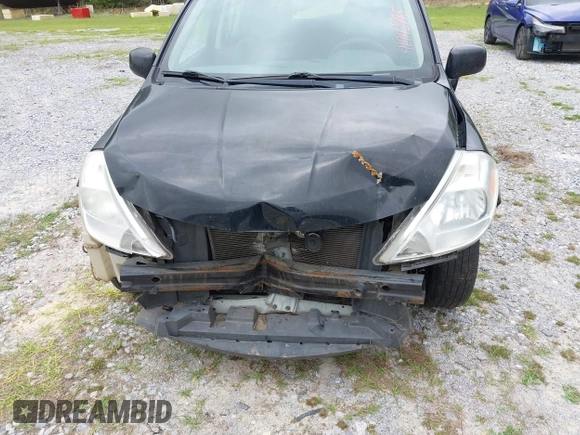 2009 Nissan Versa SL z VIN 3N1BC13E49L488417, wystawiony jako IAAI lot #41943795 z przebiegiem 221 010 mil mil oraz . Historia ofert i sprzedaży dostępna na DreamBid. Obrazek 6.