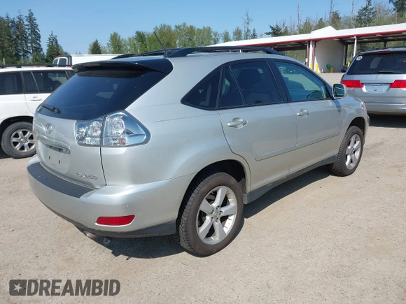2007 Lexus RX 350 with VIN 2T2HK31U37C028032, listed as a IAAI auction lot 42117631 with 142,430 mi miles. Bid and sale history available at carsss.com. Image 4.