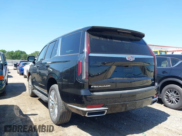 2023 Cadillac Escalade 4WD Premium Luxury with VIN 1GYS4BKL0PR409325, listed as a IAAI auction lot 41973567 with 32,398 mi miles and . Bid and sale history available at DreamBid. Image 3.