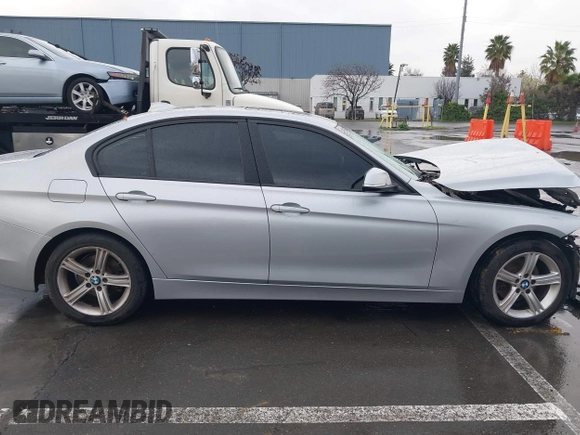 2013 BMW 3 Series 328i with VIN WBA3C1G59DNN93746, listed as a IAAI auction lot 41527720 with 215,442 mi miles and . Bid and sale history available at DreamBid. Image 13.