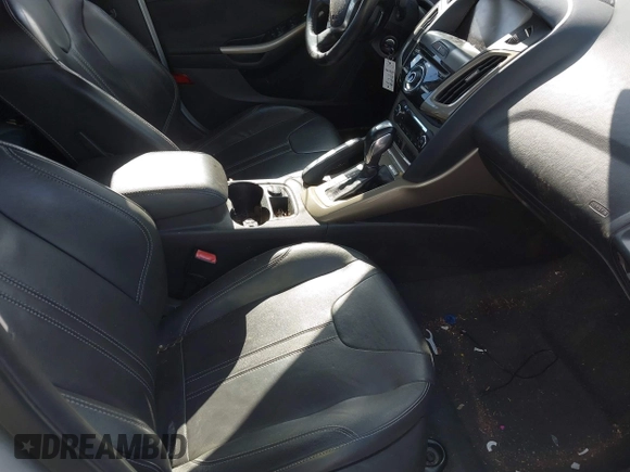 2012 Ford Focus SEL with VIN 1FAHP3H29CL151658, listed as a IAAI auction lot 42060139 with 149,547 mi miles and . Bid and sale history available at carsss.com. Image 5.