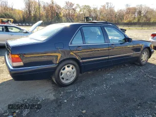 1996 Mercedes-Benz S with VIN WDBGA43E6TA299243, listed as a Copart auction lot 79664294 with 168,356 mi miles and Salvage Title. Bid and sale history available at DreamBid. Image 3.