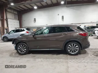 2019 Infiniti QX50 Luxe with VIN 3PCAJ5M36KF134096, listed as a IAAI auction lot 41851337 with 77,647 mi miles and . Bid and sale history available at DreamBid. Image 14.