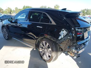 2020 Cadillac XT4 FWD Premium Luxury with VIN 1GYFZCR42LF144359, listed as a IAAI auction lot 42012677 with 34,490 mi miles and . Bid and sale history available at carsss.com. Image 3.