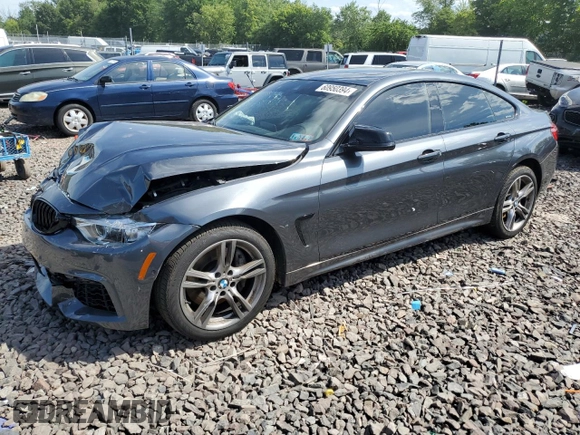 2015 BMW 4 Series 435i xDrive with VIN WBA4B3C51FGV48297, listed as a Copart auction lot 60950394 with 105,509 mi miles and Salvage Title. Bid and sale history available at DreamBid. Image 1.