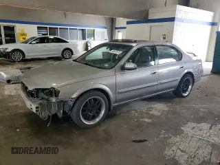 2000 Nissan Maxima GXE z VIN JN1CA31A7YT032962, wystawiony jako Copart lot #56947675 z przebiegiem 198 041 mil mil oraz Szkoda całkowita • Salvage title. Historia ofert i sprzedaży dostępna na DreamBid. Obrazek 1.