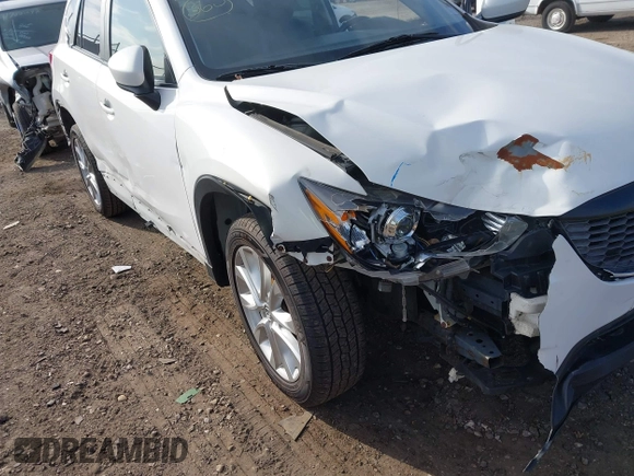 2014 Mazda CX-5 Grand Touring with VIN JM3KE4DY7E0425201, listed as a IAAI auction lot 41803597 with 118,867 mi miles. Bid and sale history available at carsss.com. Image 6.