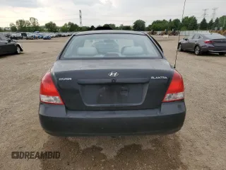 2003 Hyundai Elantra GLS z VIN KMHDN45D63U594320, wystawiony jako Copart lot #58742565 z przebiegiem 163 772 mil mil oraz Szkoda całkowita • Salvage title. Historia ofert i sprzedaży dostępna na DreamBid. Obrazek 6.