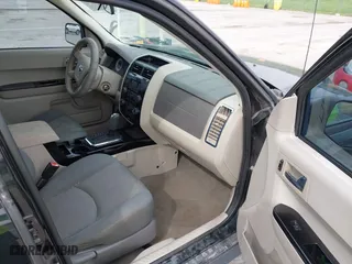 2008 Mazda Tribute Grand Touring with VIN 4F2CZ02Z48KM26109, listed as a IAAI auction lot 42011447 with 221,686 mi miles. Bid and sale history available at carsss.com. Image 5.