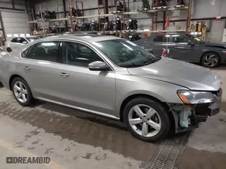 2013 Volkswagen Passat SE w/Sunroof with VIN 1VWBH7A39DC017996, listed as a IAAI auction lot 41206094 with 107,675 mi miles. Bid and sale history available at carsss.com. Image 1.