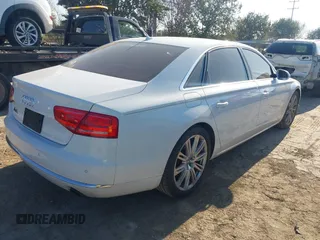 2014 Audi A8 3.0T z VIN WAURGAFDXEN006902, wystawiony jako IAAI lot #41099662 z przebiegiem 118 734 mil mil oraz . Historia ofert i sprzedaży dostępna na DreamBid. Obrazek 4.