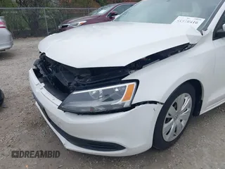 2014 Volkswagen Jetta SE z VIN 3VWD17AJ8EM211169, wystawiony jako IAAI lot #41978416 z przebiegiem 141 545 mil mil oraz . Historia ofert i sprzedaży dostępna na DreamBid. Obrazek 19.