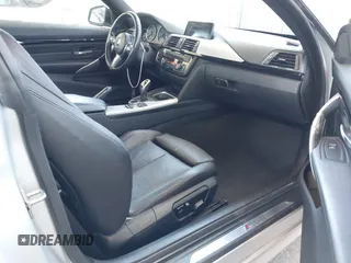 2014 BMW 4 Series 428i with VIN WBA3N7C58EF719514, listed as a IAAI auction lot 42310537 with 82,573 mi miles and . Bid and sale history available at DreamBid. Image 5.