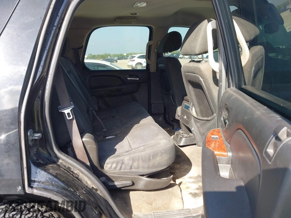 2011 Chevrolet Tahoe LS with VIN 1GNSCAE05BR380084, listed as a IAAI auction lot 42746873 with 386,755 mi miles and . Bid and sale history available at DreamBid. Image 8.