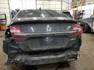 2018 Honda Clarity z VIN JHMZC5F13JC012248, wystawiony jako Copart lot #88791975 z przebiegiem 132 090 mil mil oraz Nie do naprawy • Non repairable. Historia ofert i sprzedaży dostępna na DreamBid. Obrazek 6.