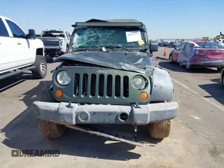 2007 Jeep Wrangler Unlimited X with VIN 1J4GA39107L186926, listed as a IAAI auction lot 42094175 with 191,810 mi miles and . Bid and sale history available at DreamBid. Image 6.