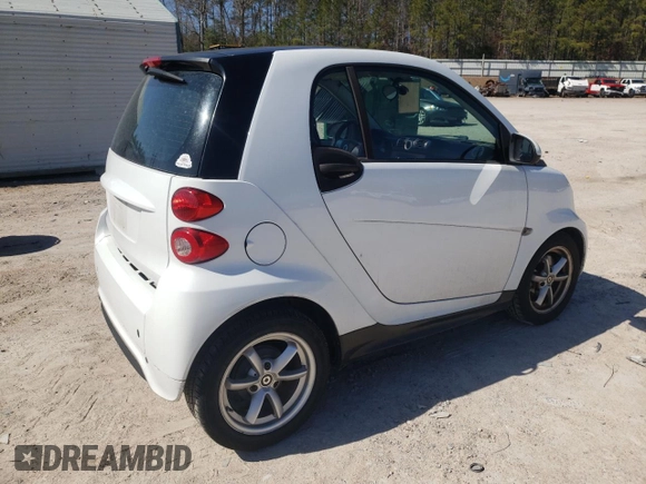 2014 Smart fortwo Pure с VIN WMEEJ3BA0EK780282, выставлен на аукционе Copart как лот 47691815 с пробегом 74 144 миль миль и Чистый • Clean title. История ставок и продаж доступна на DreamBid. Изображение 3.