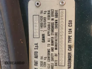1982 FIAT 124 Spider z VIN ZFAAS00B0C5003902, wystawiony jako Copart lot #51425625 z przebiegiem 77 842 mil mil oraz Szkoda całkowita • Salvage title. Historia ofert i sprzedaży dostępna na DreamBid. Obrazek 12.