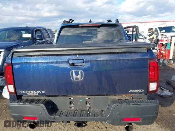 2022 Honda Ridgeline RTL-E z VIN 5FPYK3F7XNB029931, wystawiony jako IAAI lot #41213133 z przebiegiem Nie podano mil oraz . Historia ofert i sprzedaży dostępna na DreamBid. Obrazek 16.