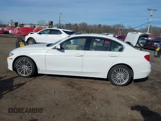 2014 BMW 3 Series 335i xDrive with VIN WBA3B9C52EJ466045, listed as a IAAI auction lot 41281384 with 136,329 mi miles. Bid and sale history available at carsss.com. Image 14.