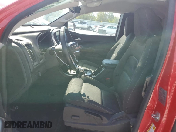 2015 GMC Canyon 2WD SLE with VIN 1GTH5BEA6F1142406, listed as a Copart auction lot 72416354 with 121,670 mi miles and Salvage Title. Bid and sale history available at carsss.com. Image 7.