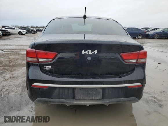 2023 Kia Rio LX with VIN 3KPA24AD7PE616450, listed as a Copart auction lot 84690444 with 28,908 mi miles and Salvage Title. Bid and sale history available at DreamBid. Image 6.
