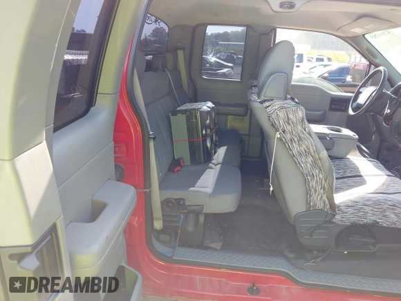 2007 Ford F-150 STX with VIN 1FTRX14W37FA65987, listed as a IAAI auction lot 42064283 with 164,730 mi miles. Bid and sale history available at carsss.com. Image 8.