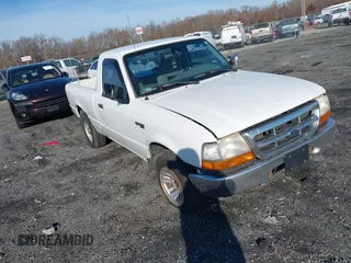 1999 Ford Ranger XLT with VIN 1FTYR10X0XTB14312, listed as a IAAI auction lot 40942860 with 130,236 mi miles and . Bid and sale history available at DreamBid. Image 1.