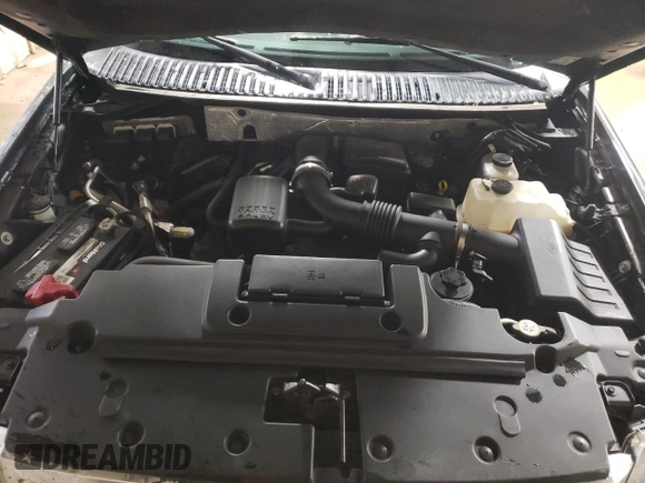 2010 Ford Expedition Eddie Bauer with VIN 1FMJU1J55AEB59198, listed as a Copart auction lot 52499065 with 130,865 mi miles and Salvage title. Bid and sale history available at DreamBid. Image 11.