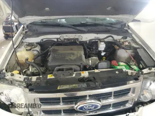 2010 Ford Escape Limited z VIN 1FMCU9EG4AKC43050, wystawiony jako Copart lot #60251495 z przebiegiem 174 550 mil mil oraz Szkoda całkowita • Salvage title. Historia ofert i sprzedaży dostępna na DreamBid. Obrazek 12.