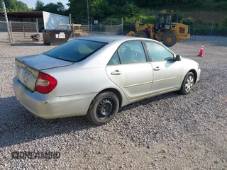 2004 Toyota Camry LE z VIN 4T1BE32K64U939657, wystawiony jako IAAI lot #42539274 z przebiegiem 271 429 mil mil oraz . Historia ofert i sprzedaży dostępna na DreamBid. Obrazek 4.