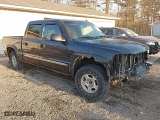 2004 GMC Sierra 1500 Crew Cab SLE with VIN 2GTEK13T041435042, listed as a IAAI auction lot 41777775 with 218,745 mi miles. Bid and sale history available at carsss.com. Image 1.