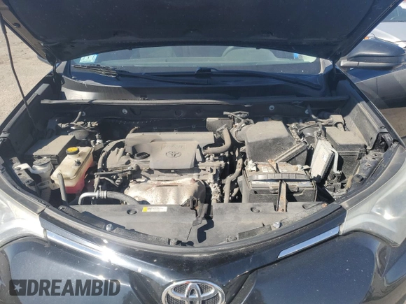 2016 Toyota RAV4 LE with VIN 2T3BFREV8GW433295, listed as a Copart auction lot 53089495 with 127,670 mi miles and Salvage Title. Bid and sale history available at DreamBid. Image 12.