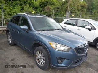 2014 Mazda CX-5 Touring with VIN JM3KE2CY2E0429971, listed as a IAAI auction lot 42274965 with 255,246 mi miles and . Bid and sale history available at DreamBid. Image 1.