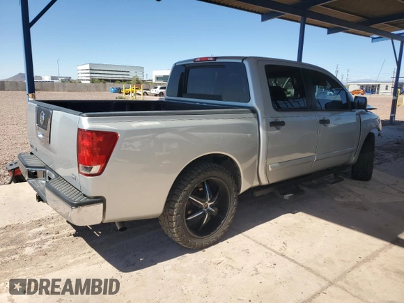 2012 Nissan Titan SV with VIN 1N6AA0EK5CN327266, listed as a Copart auction lot 49706135 with 188,366 mi miles and Salvage Title. Bid and sale history available at DreamBid. Image 3.