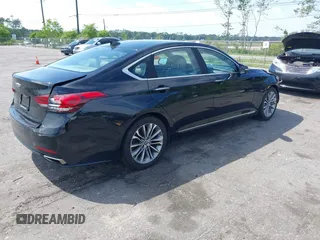 2015 Hyundai Genesis 3.8L with VIN KMHGN4JE5FU063075, listed as a IAAI auction lot 42043518 with 135,079 mi miles. Bid and sale history available at carsss.com. Image 4.