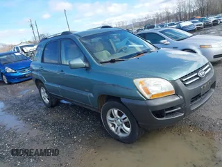2005 Kia Sportage LX with VIN KNDJE723357058608, listed as a IAAI auction lot 41564533 with 262,794 mi miles and . Bid and sale history available at carsss.com. Image 1.