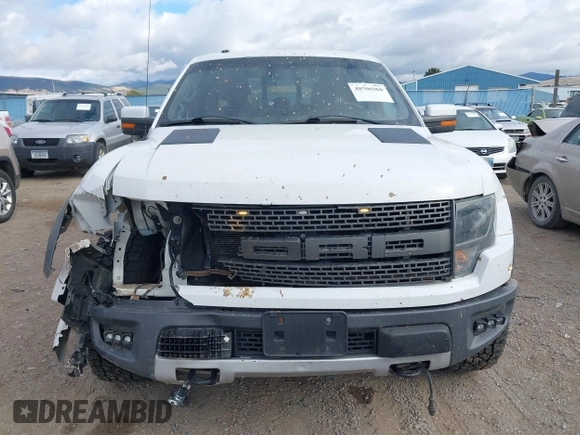 2014 Ford F-150 SVT Raptor with VIN 1FTFW1R62EFC00548, listed as a IAAI auction lot 40706960 with 71,590 mi miles and . Bid and sale history available at carsss.com. Image 12.