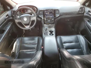 2019 Jeep Grand Cherokee Trailhawk with VIN 1C4RJFLT4KC787940, listed as a Copart auction lot 60883895 with 77,160 mi miles and Salvage title. Bid and sale history available at DreamBid. Image 8.
