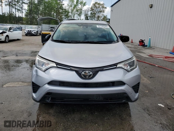 2017 Toyota RAV4 LE with VIN 2T3ZFREV3HW387441, listed as a Copart auction lot 51742245 with 104,823 mi miles and Salvage Title. Bid and sale history available at DreamBid. Image 5.