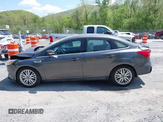 2018 Ford Focus Titanium с VIN 1FADP3J22JL314642, выставлен на аукционе IAAI как лот 42128194 с пробегом 62 787 миль миль и . История ставок и продаж доступна на DreamBid. Изображение 14.